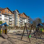 公寓 Karkonosky Apartamenty- Naturalny Czar 斯克拉斯卡波伦巴